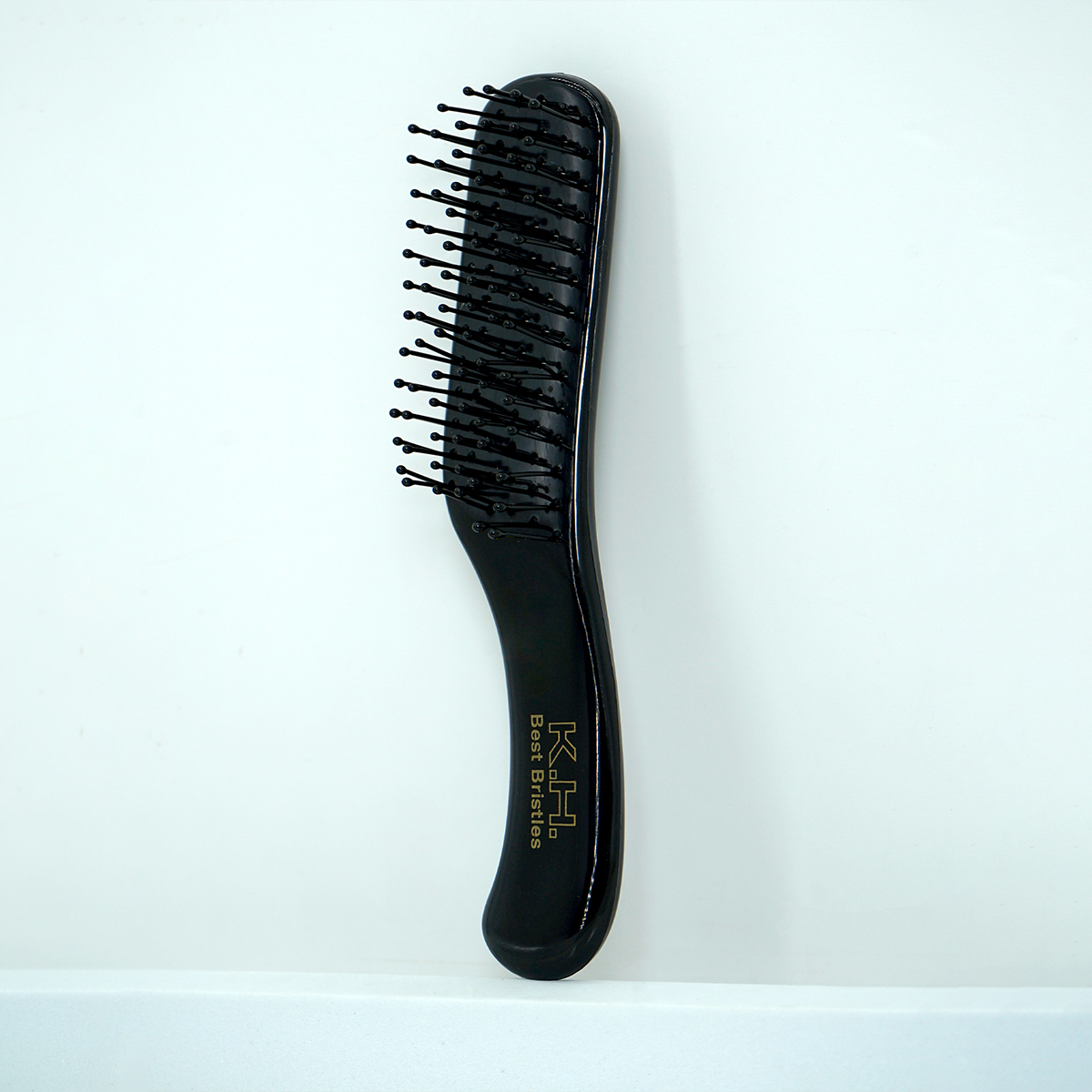 Hair Care Tips - Compact Black Paddle Hair Brush -